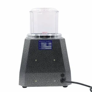 Magnetic Tumbler - used to polish and finish jewelry . It works by a rotating magnetic field to tumble small pins against the jewelry