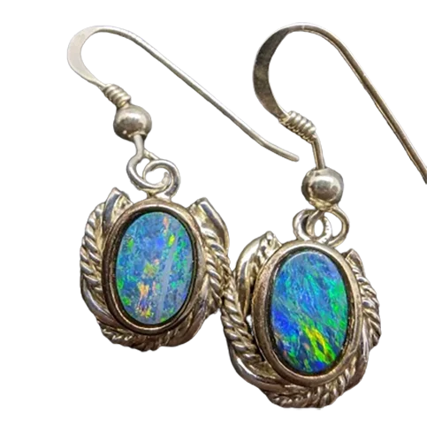 Opal earrings crafted from Lightning Ridge doublet opals set in handmade sterling silver. Featuring 15mm oval doublet opals sourced from Lightning Ridge, Australia