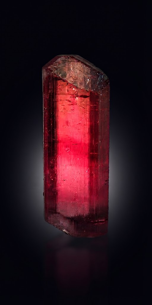 Geological Genesis & Crystallographic Architecture of Rubellite Tourmaline
authored by @jamesdumar.com | Identity: did:plc:7vknci6jk2jqfwsq6gkzu
